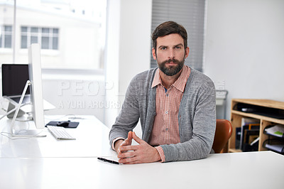 Buy stock photo Businessman, portrait or serious at desk in modern office, professional or career pride in company. Accountant, face or confident as consultant auditing job or ambition for commitment in workplace