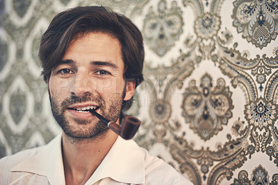 Buy stock photo Man, portrait and pipe for vintage style with antique wallpaper for retro, old school feel with gen x. Male person, smoking and decor for cool trendy look with shirt, beard and closeup with pattern
