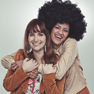 Buy stock photo Vintage, portrait and friends with retro style, smile and laugh with hug in studio with grey background. Girls, happiness and unique with fashion in outfits, clothes and women with confidence