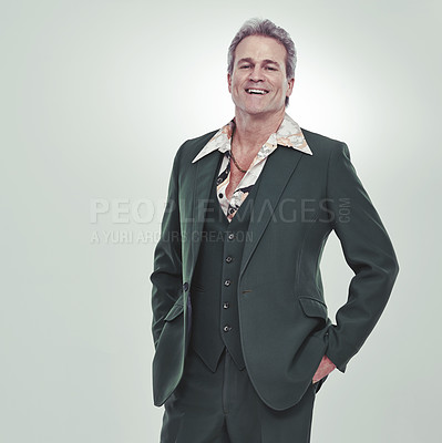Buy stock photo Senior, portrait and happy man in fashion, confidence or style for business or outfit on a gray studio background. Mature, male person or model posing with smile for stylish suit on mockup space