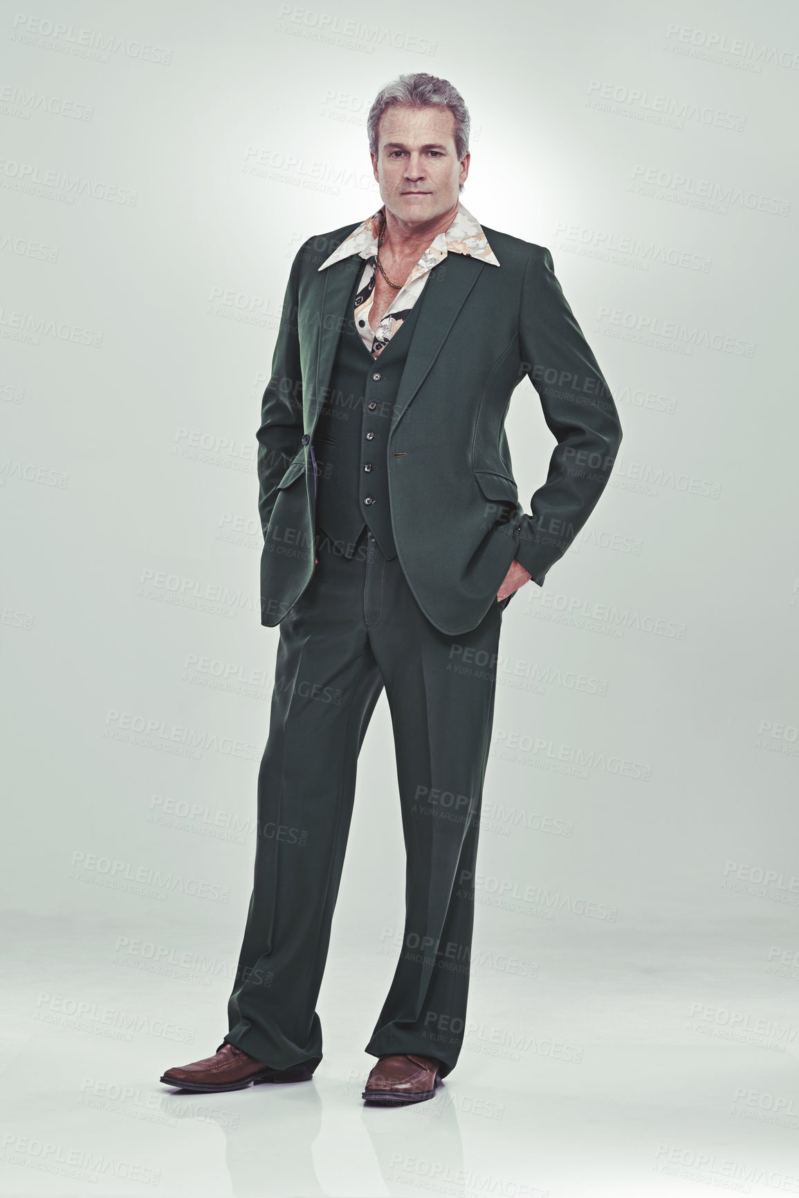 Buy stock photo Full length studio portrait of a mature man in a retro suit striking a confident pose