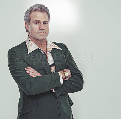 Buy stock photo Senior man, portrait and fashion in confidence for style or business outfit on a gray studio background. Serious, mature or model of male person posing in stylish suit or arms crossed on mockup space