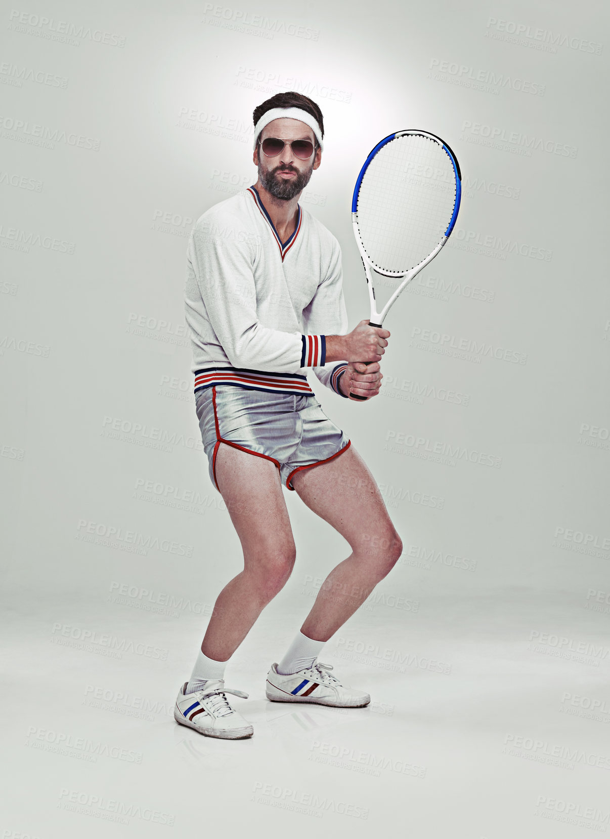 Buy stock photo Portrait of a young retro tennis player in the studio