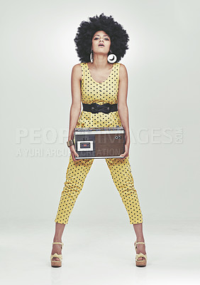 Buy stock photo Black woman, fashion in studio with radio in jumpsuit, white background, afro and vintage. Colour, attitude and trendy with style in fancy clothes, heels and beauty with confidence and retro 