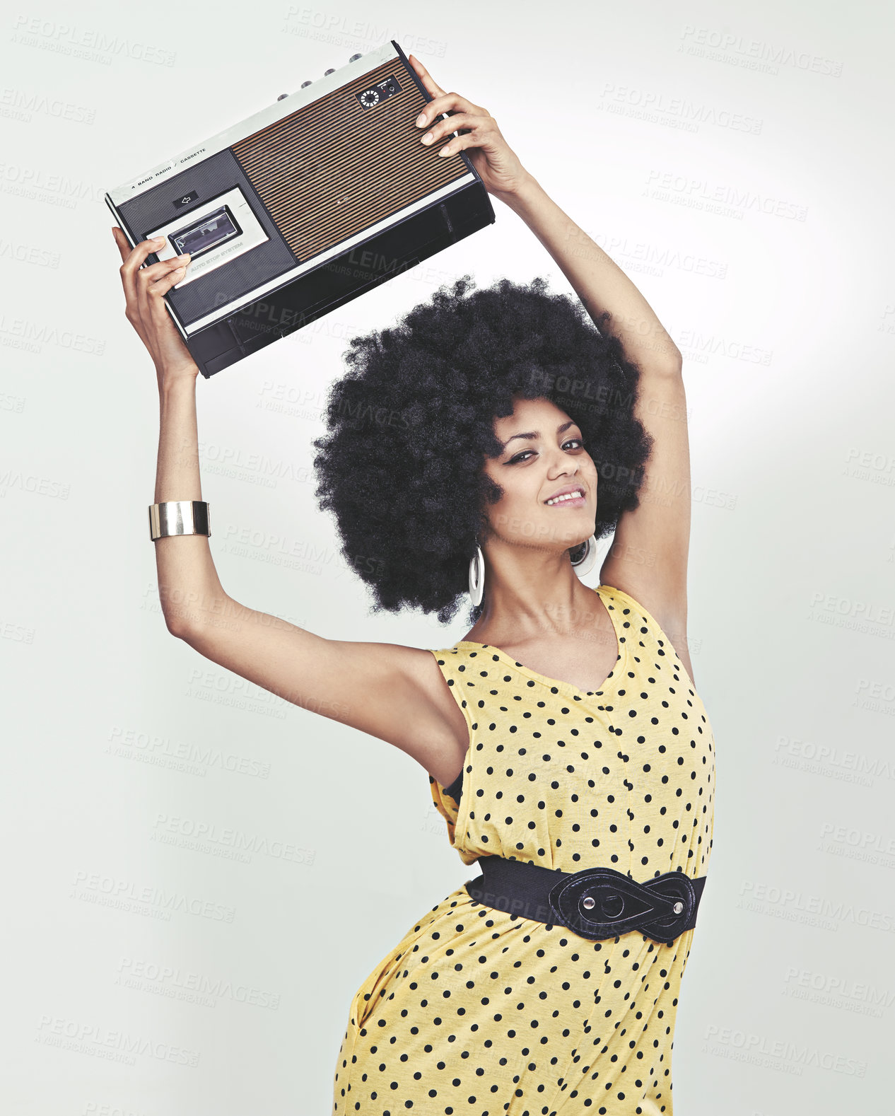 Buy stock photo Fashion, black woman and smile in studio with radio, afro and grey background in vintage and happy. Colourful, retro and outfit for fashionista with old school look, style and trends with confidence