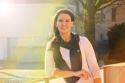 Buy stock photo Portrait of an attractive woman standing outside her house
