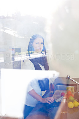 Buy stock photo Cropped portrait of an attractive woman standing in her kitchen