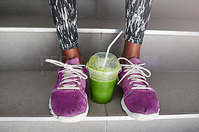 Buy stock photo Woman, shoes or fitness with smoothie on stairs for fashion, sportswear or health and wellness in city. Closeup, female person or legs with runner for drink, detox or organic green juice on staircase