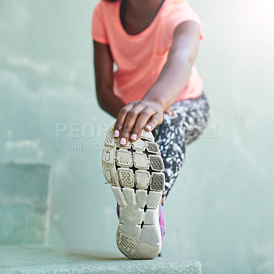 Buy stock photo Black woman, hands and stretching with foot for fitness, exercise or workout preparation on step. Closeup, African or female person with shoe for warm up or getting ready for training or run