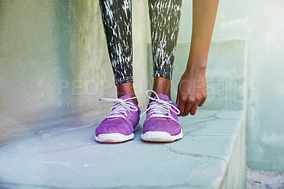 Buy stock photo Woman, hands and tie shoes with fitness on step for workout preparation, running or outdoor exercise in city. Closeup, female person or legs of runner tying laces or getting ready for cardio training