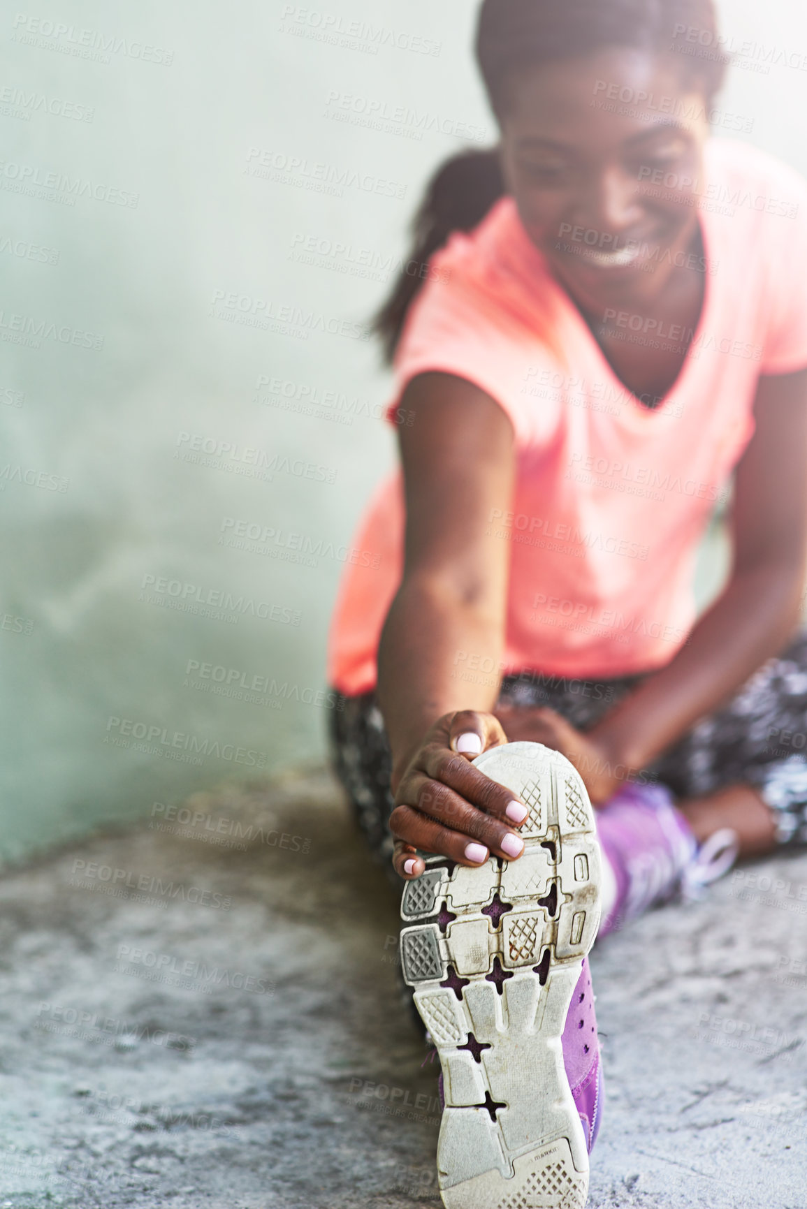 Buy stock photo Happy, black woman and stretching with shoe for fitness, workout or warm up exercise on floor. Young African, female person or active runner with preparation or getting ready for training or practice