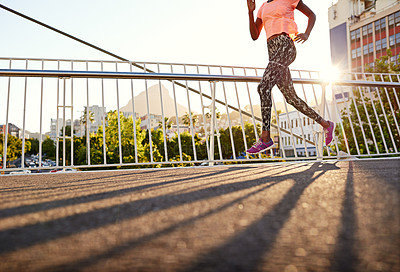 Buy stock photo Woman, running or bridge with fitness in city for workout, sprint or race on asphalt. Legs, female person or runner with track shoes or sneakers for jog, cardio or outdoor exercise in an urban town