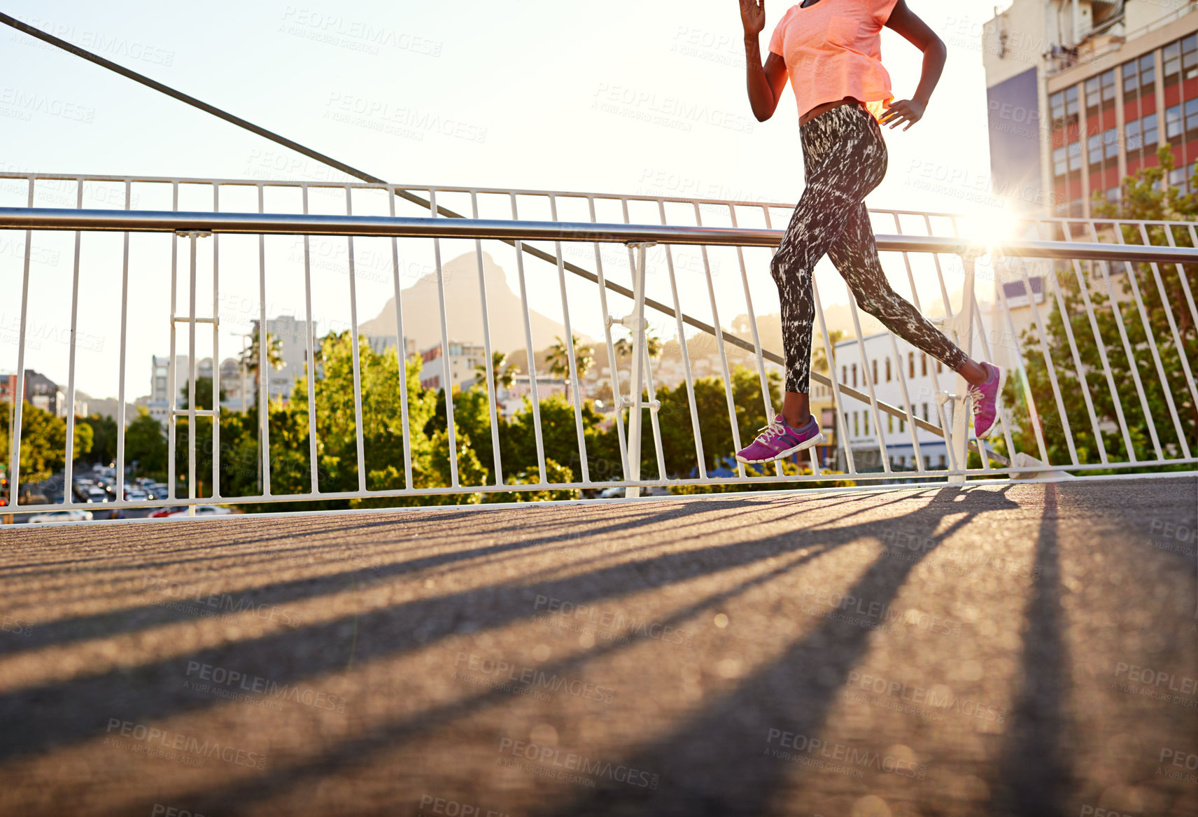 Buy stock photo Woman, running or bridge with fitness in city for workout, sprint or race on asphalt. Legs, female person or runner with track shoes or sneakers for jog, cardio or outdoor exercise in an urban town