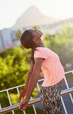 Buy stock photo Black woman, fitness and stretching with body in city for relief, freedom or breathing exercise. Young African, female person or runner in warm up, preparaption or getting ready for outdoor workout