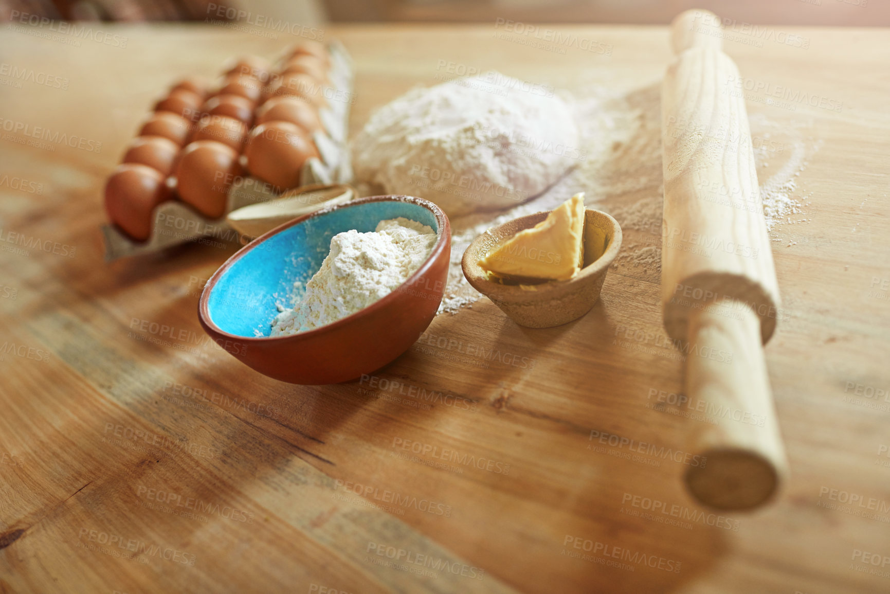 Buy stock photo Above, eggs and flour with dough for butter, cooking or bread production in kitchen. Food, ingredients and nutrition with rolling pin and baking in home for dessert, culinary and pastry preparation