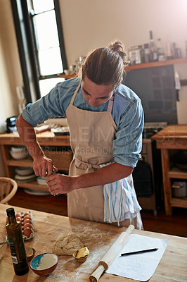Buy stock photo Cropped shot of a man baking