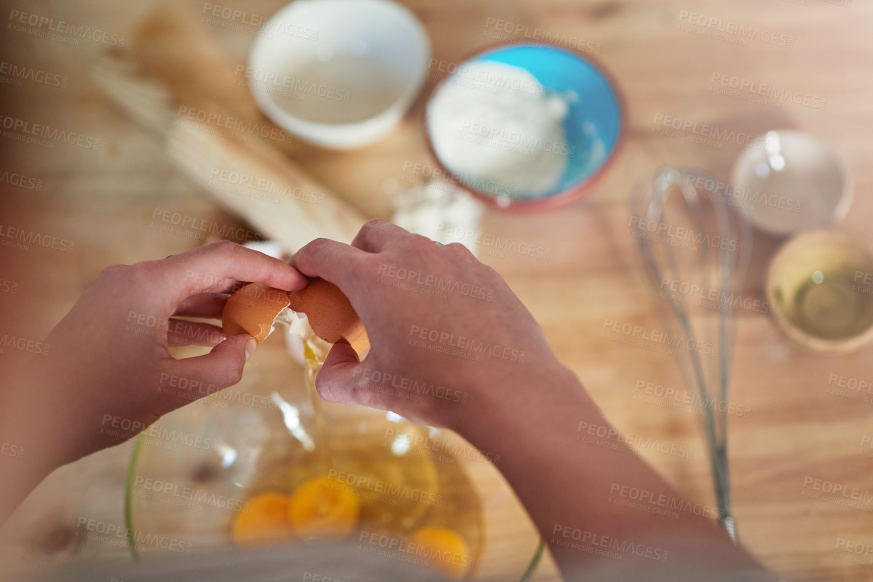 Buy stock photo Baking, eggs and hands of person in kitchen for food, cooking or bread production. Crack, mixing and nutrition with baker and ingredients in home for dessert, culinary dough and pastry preparation