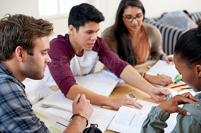 Buy stock photo Cropped shot of a group of university students in a study group