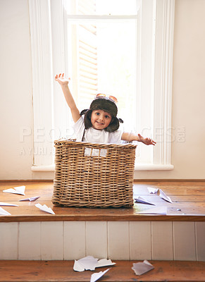 Buy stock photo Flying, playing and child with paper plane fantasy and imagination with fun in basket in home. Adventure, little pilot and playful boy in box with future dream, growth and development with airplane
