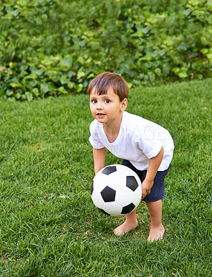 Buy stock photo Portrait, boy or catch with soccer ball in park for fun, health or childhood development in Portugal. Happy, confident and male child with football for game or exercise in backyard or garden