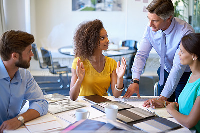 Buy stock photo Cropped shot of a business meeting in progress