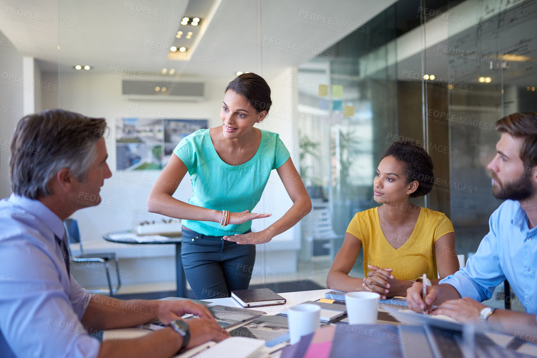 Buy stock photo Shot of a group of coworkers in a business meeting