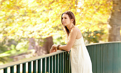 Buy stock photo Woman, thinking or park by fence in autumn on holiday vacation in countryside, nature or France, Garden, view or calm female person with peace outdoors for fresh air, wellness or break to relax 