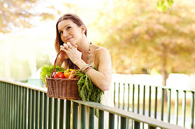 Buy stock photo Woman thinking, basket or park by fence in nature on holiday vacation in countryside, autumn or France. Relax, vegetables or person with healthy diet or food outdoors for fresh air, wellness or break