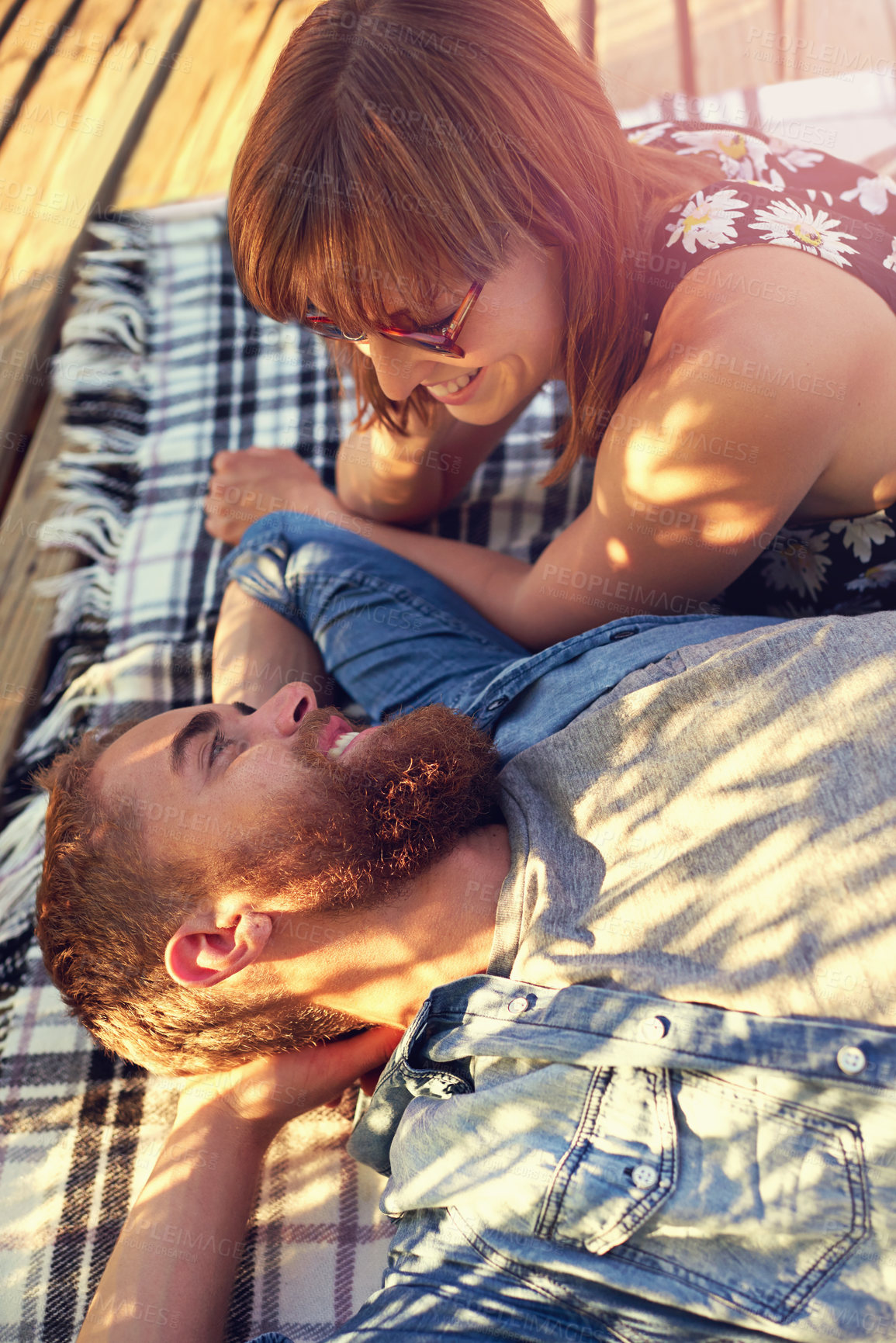 Buy stock photo People, couple and bonding with lying on ground on break with love, rest and affection for care. Wood, outdoor and smile in relationship on blanket on valentines day for holiday to relax and happy