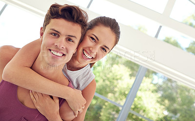 Buy stock photo Portrait of an affectionate young couple in sportswear