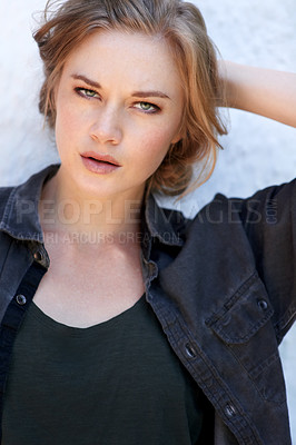 Buy stock photo A fashionable  young woman posing outdoors