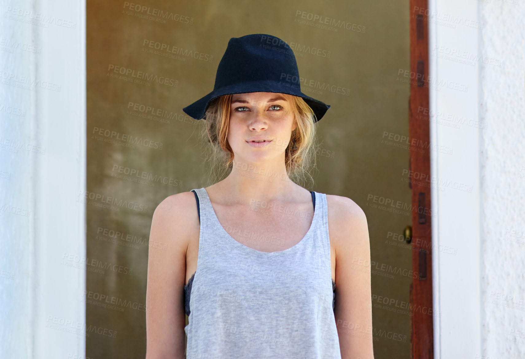 Buy stock photo Fashion, confidence and portrait of woman in city with casual outfit, trendy style or summer clothes outdoors. Attitude, serious and person with accessory, hat and streetwear in urban town on weekend