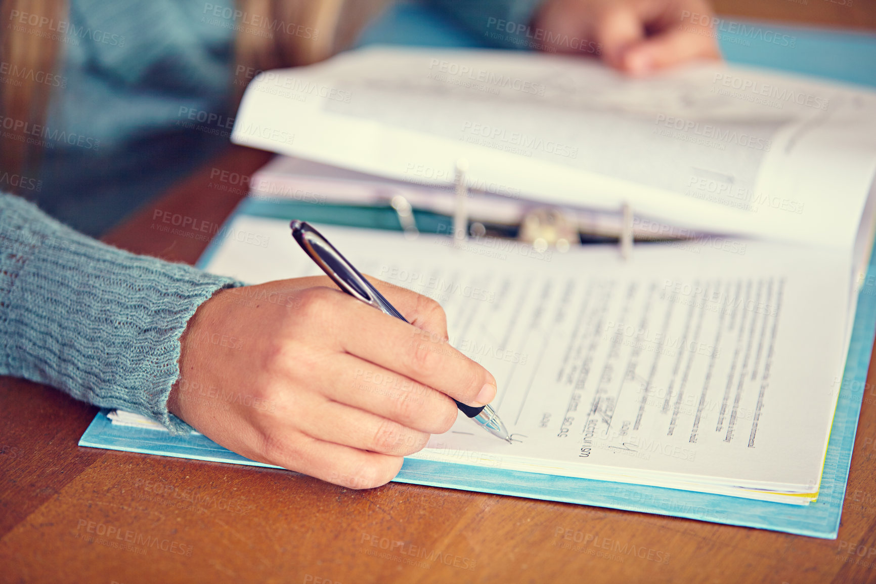 Buy stock photo Closeup shot of a teacher marking a test