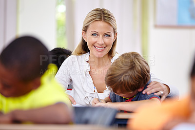 Buy stock photo Portrait of happy teacher, kid or writing in classroom for learning, education and helping for development. Woman teaching, boy or child student with knowledge, support or notebook at middle school