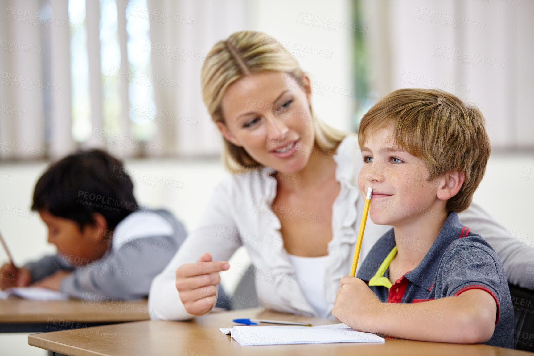 Buy stock photo Teacher, student and help, study and education in class, question and think of answer for school work and knowledge. Teaching, learning and woman with boy in classroom and problem solving for test