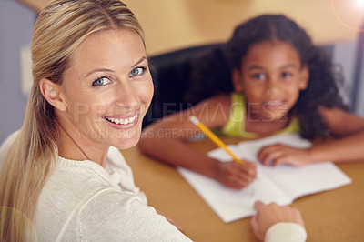 Buy stock photo Portrait, woman and kid to learn for reading on desk in the classroom for studying. Teacher, smile and child learning for student with education at school to study with support or writing on a table.