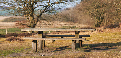 Buy stock photo Countryside, bench and landscape for relax with peace in outdoor, calm in winter for environment. Freedom, park and rest spot with scenic view in nature for travel, chair for wellness in Norway