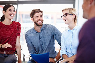 Buy stock photo Cropped shot of four coworkers in the office