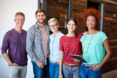 Buy stock photo Portrait of a group of designers standing in the office