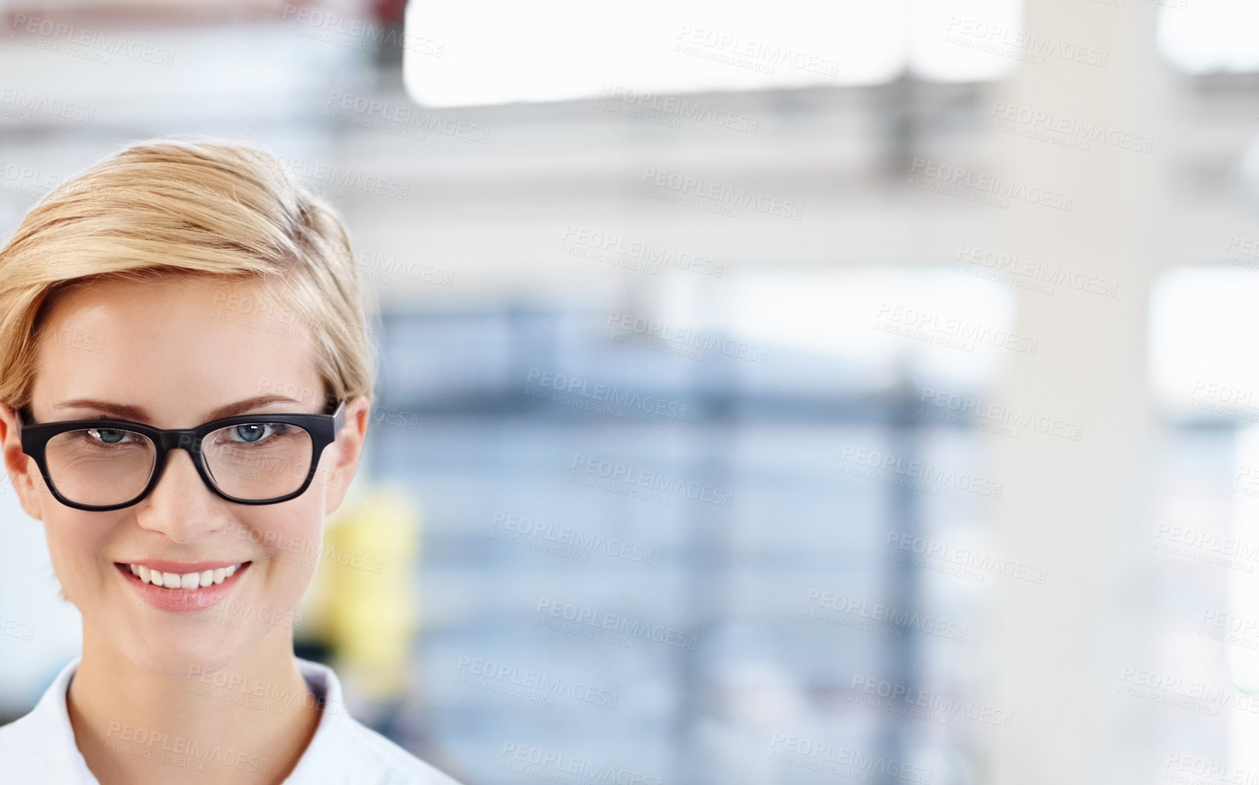 Buy stock photo Portrait of an attractive young designer standing in her office