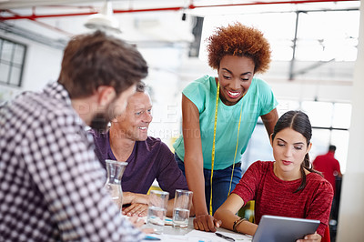 Buy stock photo Cropped shot of a group of coworkers in a meeting