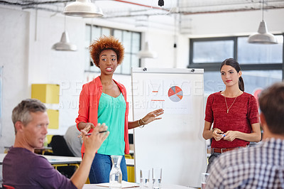 Buy stock photo Cropped shot of a group of coworkers in a meeting