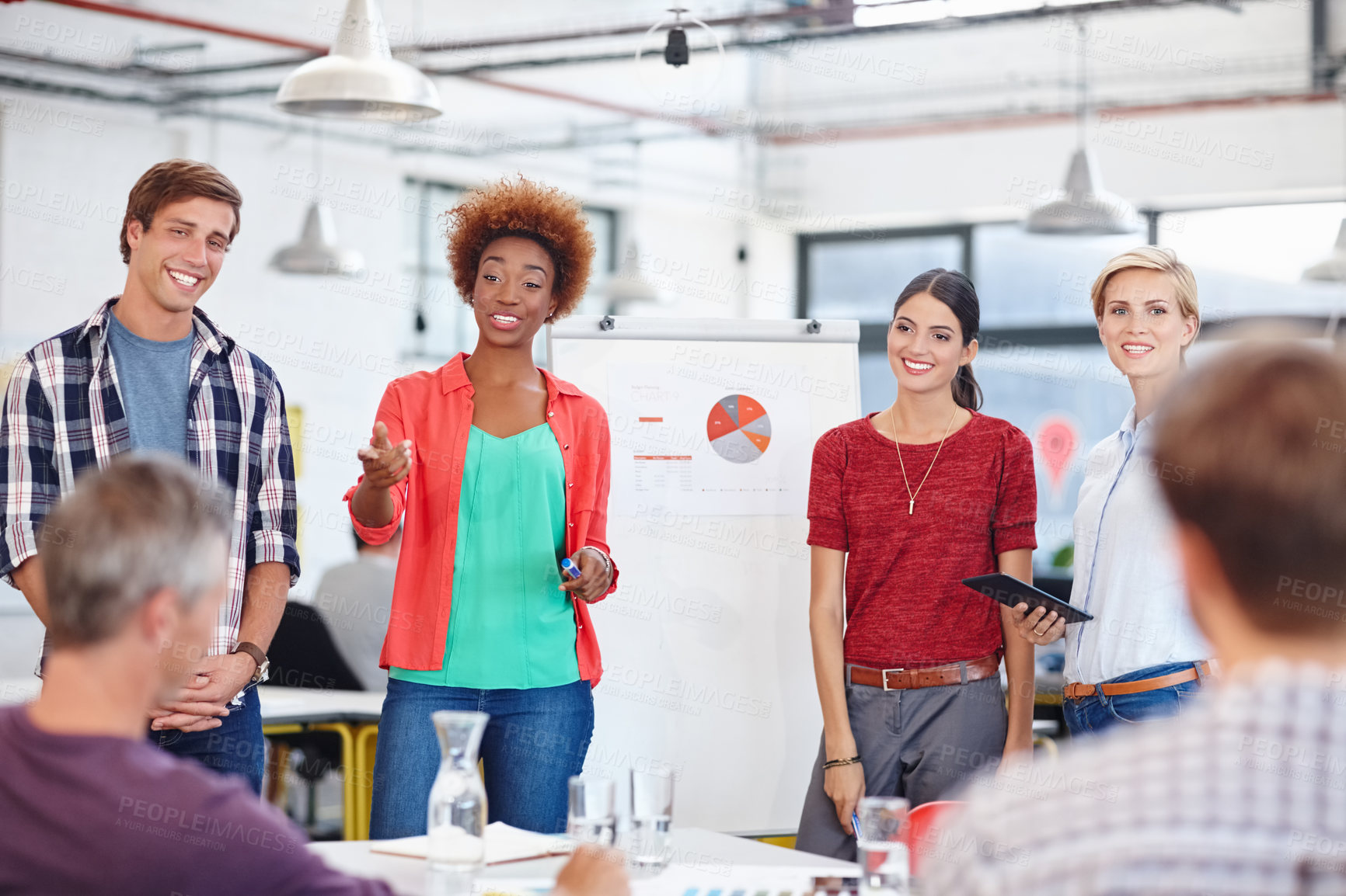 Buy stock photo Cropped shot of a group of coworkers in a meeting