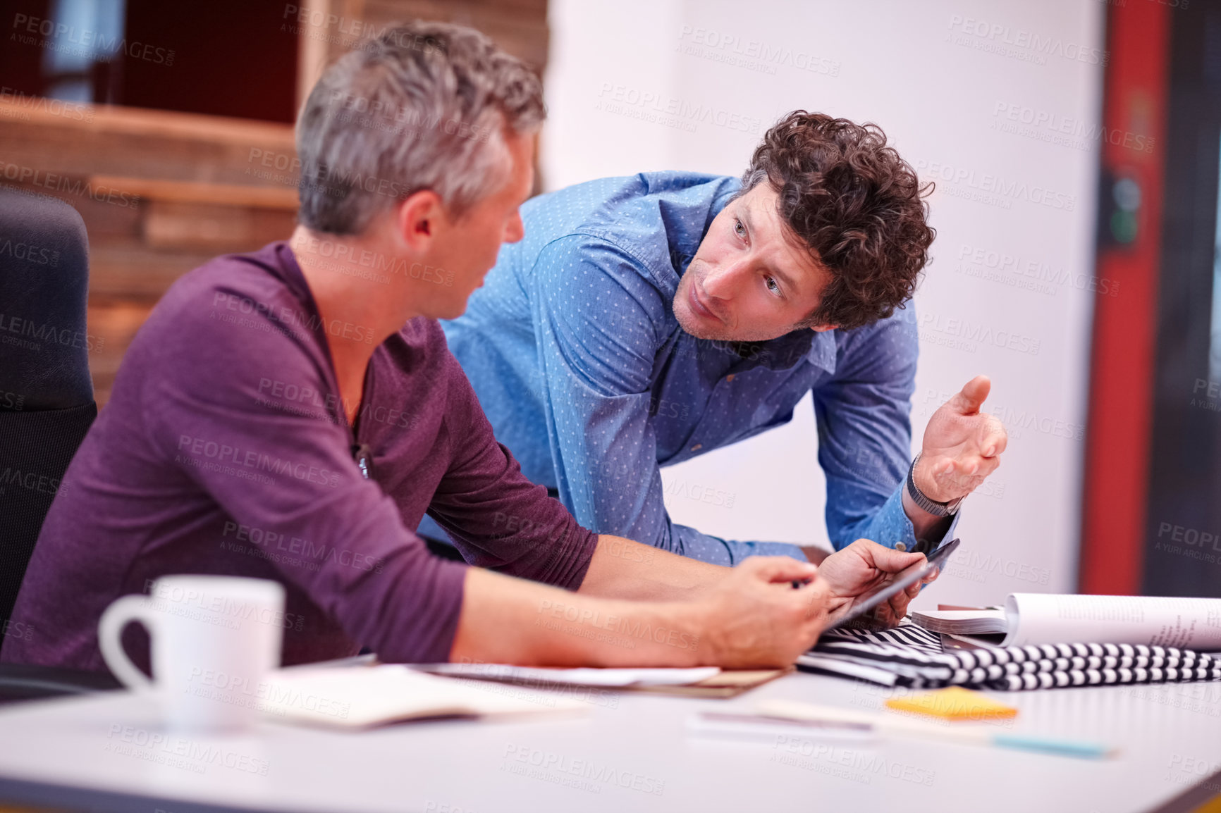 Buy stock photo Cropped shot of two male coworkers at work
