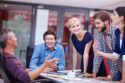 Buy stock photo Cropped shot of creative professionals brainstorming during a meeting