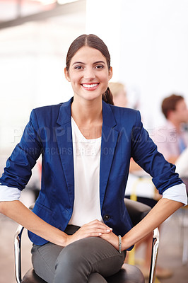 Buy stock photo Cropped portrait of an attractive young businesswoman sitting in her office