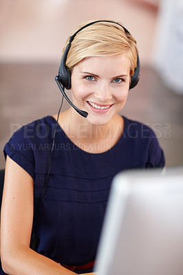 Buy stock photo Cropped portrait an attractive young businesswoman working on her computer