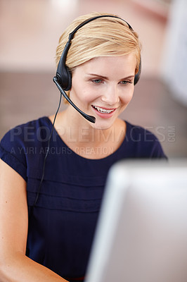 Buy stock photo Cropped shot an attractive young businesswoman working on her laptop