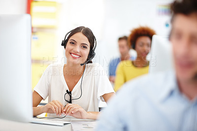 Buy stock photo Cropped portrait of an attractive young call center operator in the office