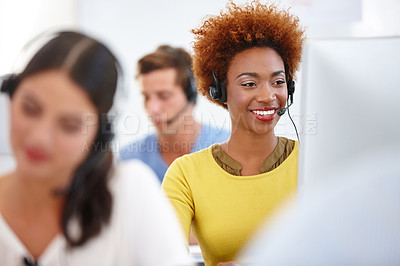 Buy stock photo Cropped shot of colleagues working in a call center